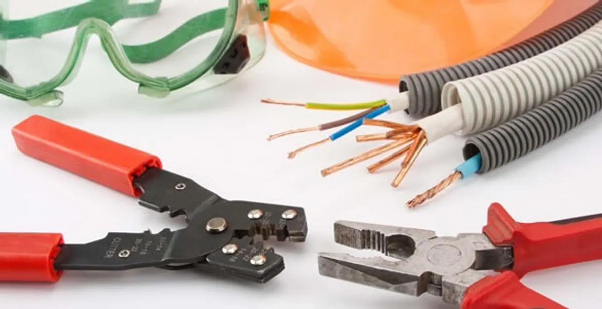 Electrical wiring repair with professional tools and safety equipment in Newcastle, OK
