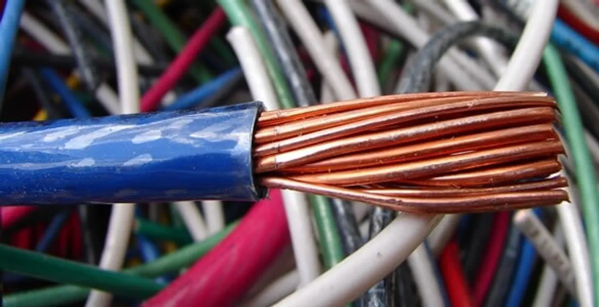electrical wiring services showing exposed copper conductors and cable preparation in Oklahoma City, OK