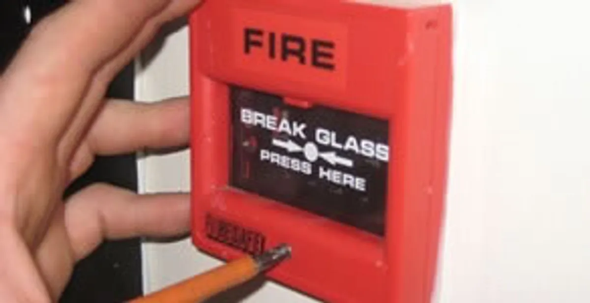 fire alarm installation service showing manual fire alarm pull station installed by licensed electricians in Oklahoma City, OK