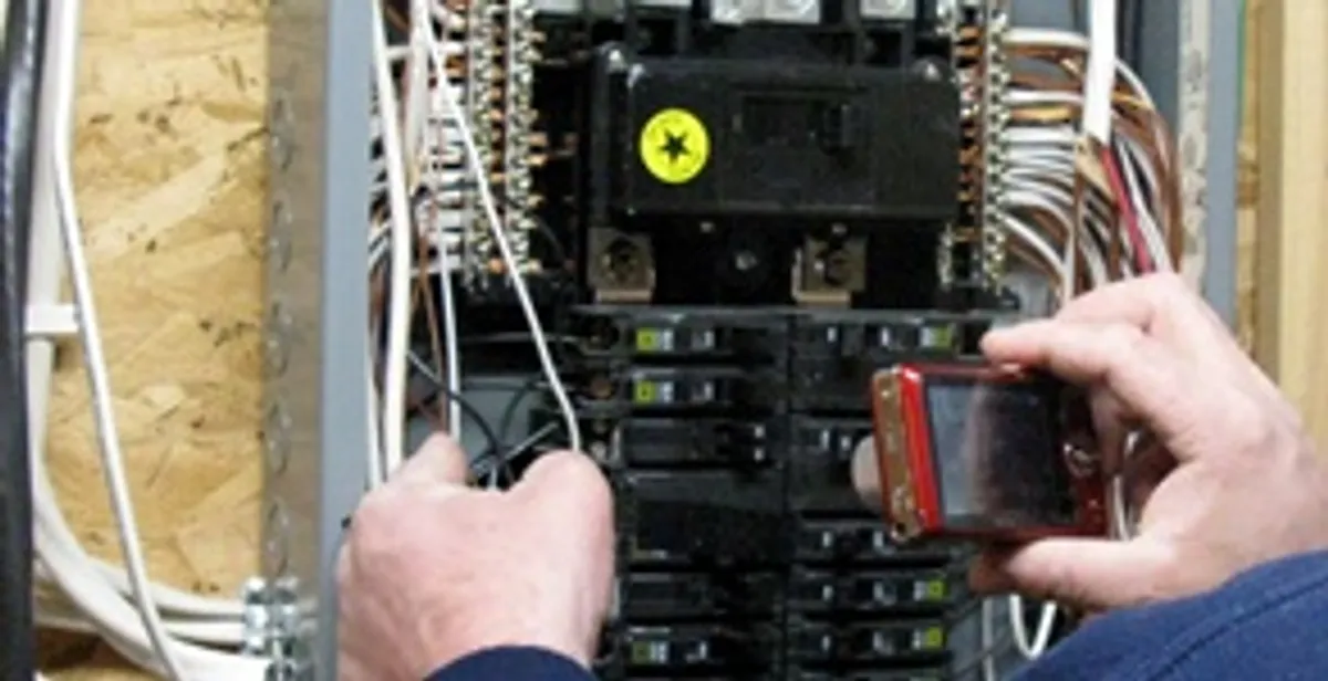 Home electrical inspection of circuit breaker panel by licensed electrician in Oklahoma City, OK