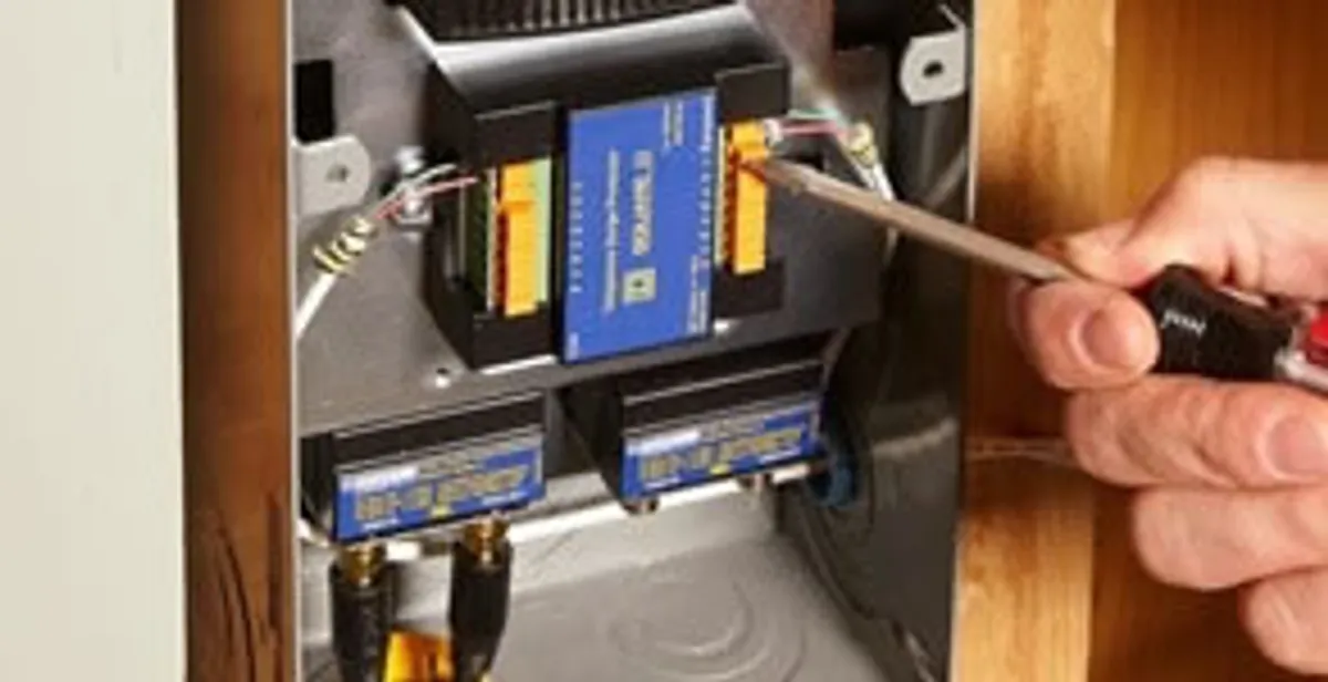 Whole home surge protection device being installed by a licensed electrician to protect electrical systems in Oklahoma City, OK